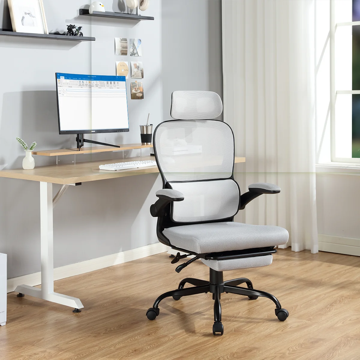 Mainstays Ergonomic Height Adjustable Mesh Office Chair for Teens and Adults with Lumbar Support and Tilt Function, with Leg Rest, Black